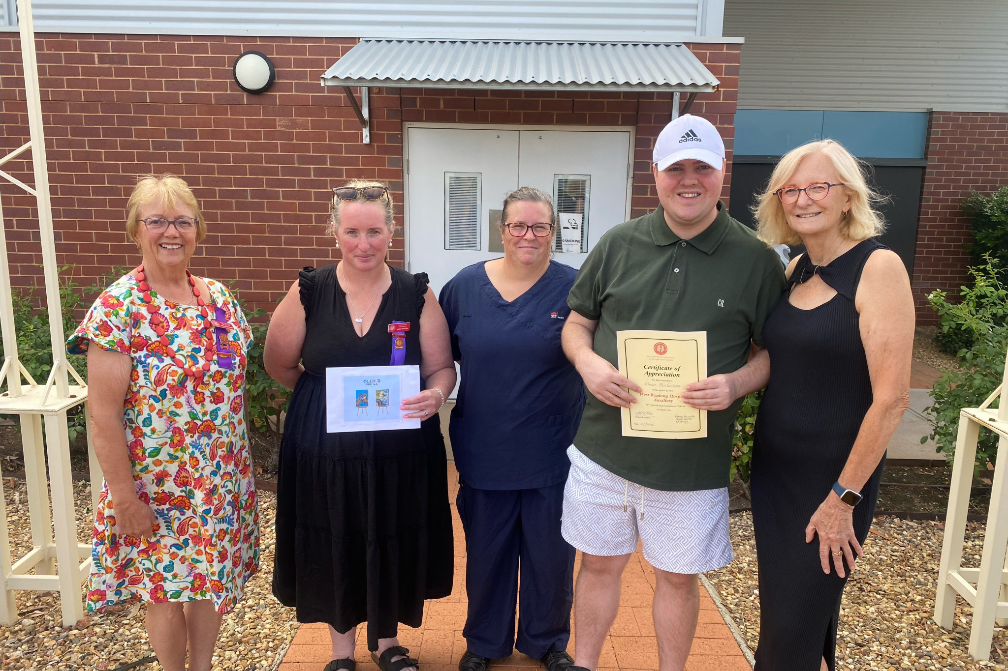 L-R WORTHY RECIPIENTS: Glenys Haworth (Treasurer Wyalong and District Hospital Auxiliary), Louise McCabe (President Wyalong and District Hospital Auxiliary), Fleur Styles (RN West Wyalong and District Hospital), Ollie and Therese MacFarlane.