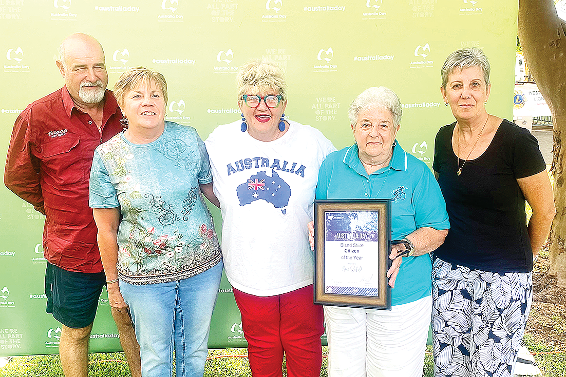 CITIZEN OF THE YEAR: Marie Seckold with her family after receiving the award for Bland Shire Council Citizen of the Year. INSET: Marie Seckold speaking on stage last Sunday January 26 at Barnardo Park. Photos by Dane Millerd.