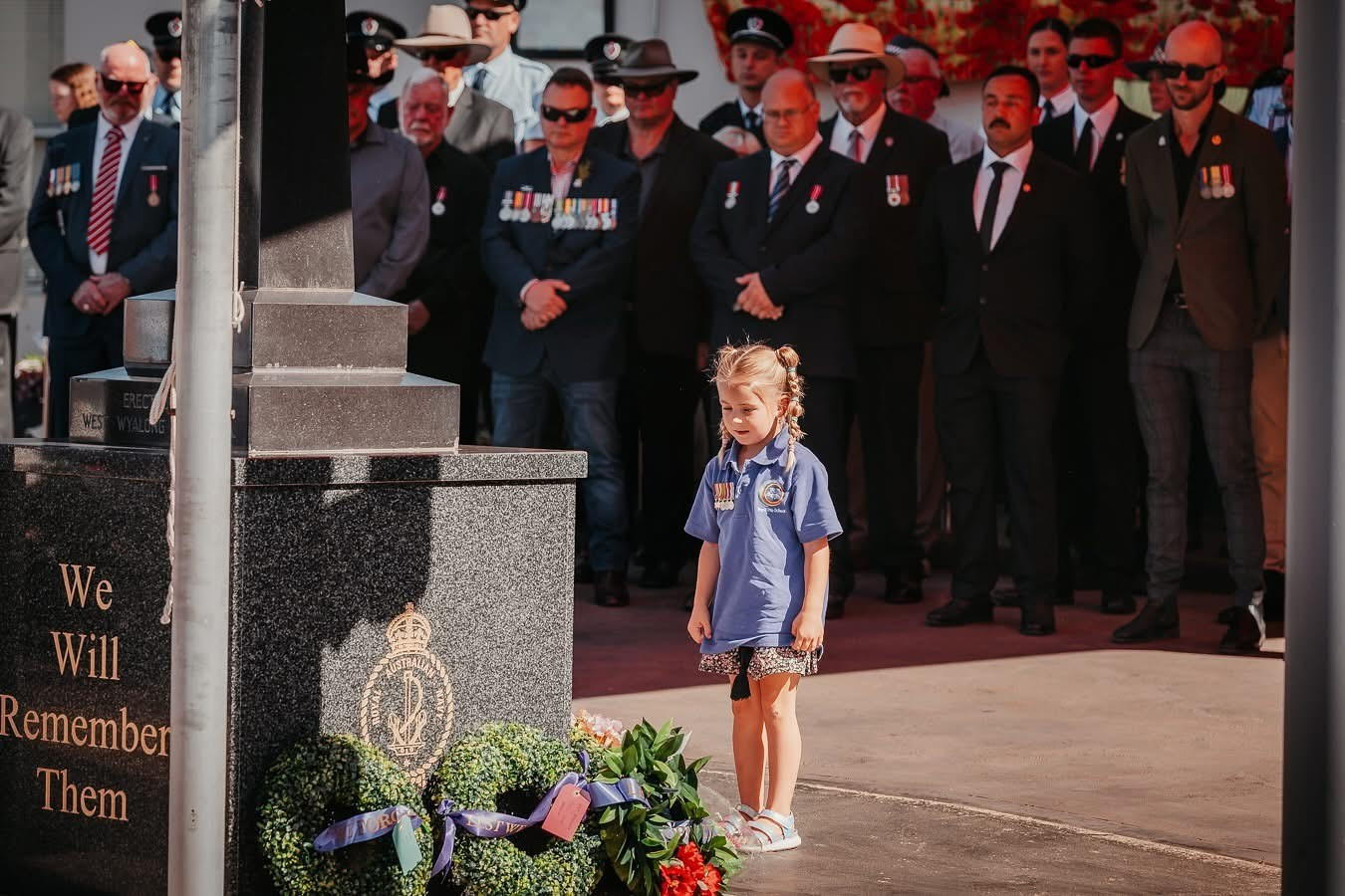 Elka Nicholson pays her respects at the West Wyalong cenotaph on ANZAC Day