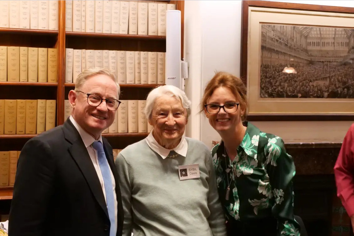 TRAILBLAZER: Sybil Davis (centre) at NSW Parliament House last month with Ben Franklin and Steph Cooke MP. Photo supplied.