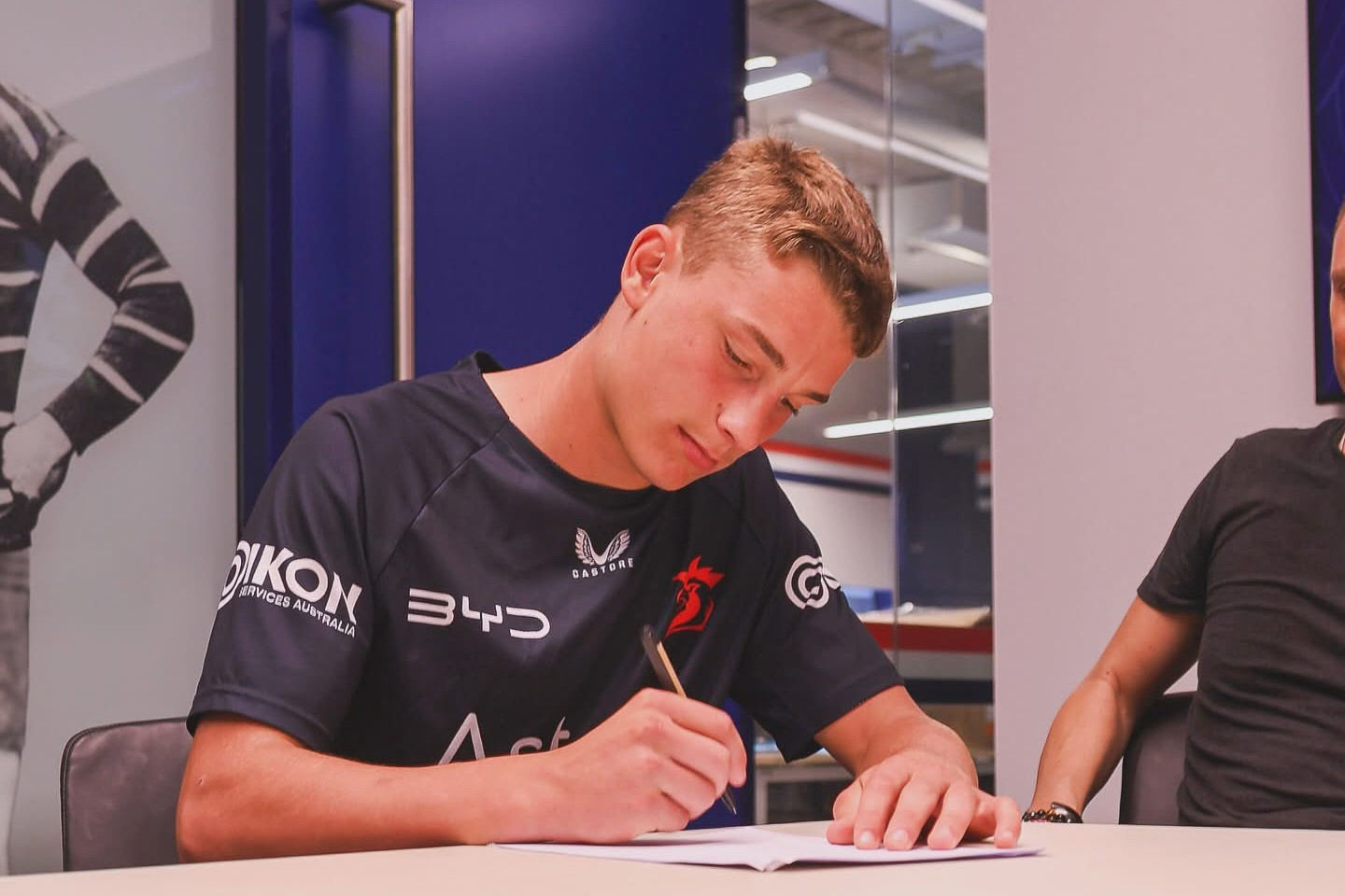 signing on the dotted line