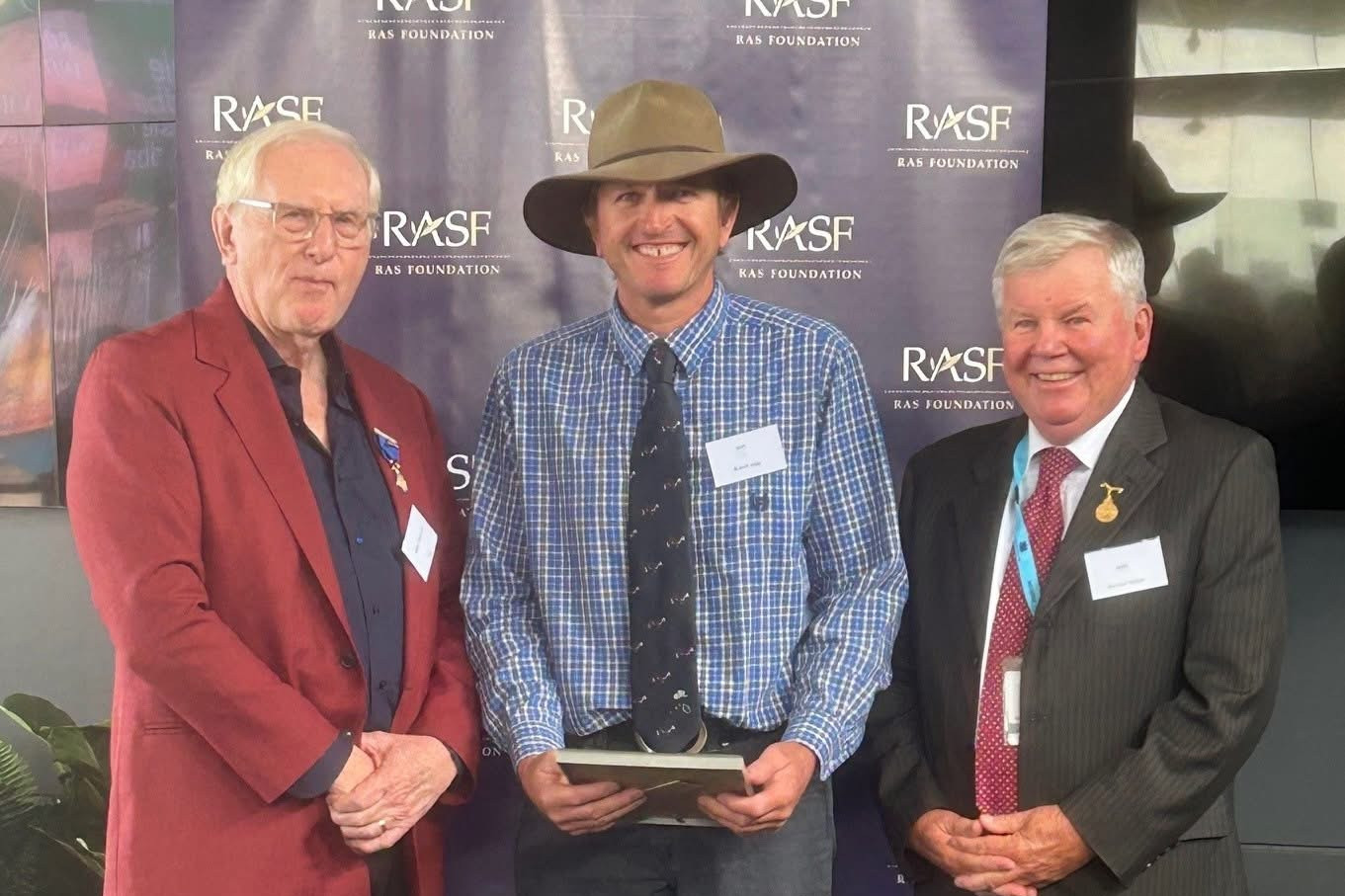 Robert Logg, past President of the West Wyalong Show Society with the grant for community development.